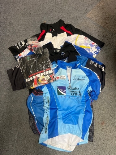 Collection of Motorsport Collectables Inc Polos, Stubby Coolers and Unopened Shirt