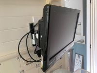 Small Grundig Wall Mounted TV