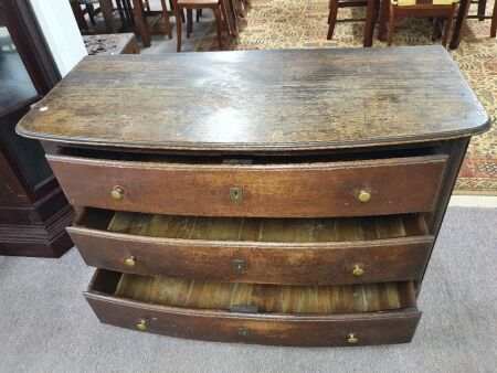 Georgian Oak Bow Fronted 3 Drawer Chest of Drawers with Original Brass Escutheons & 2/3 Iron Locks. Fielded Side Panels