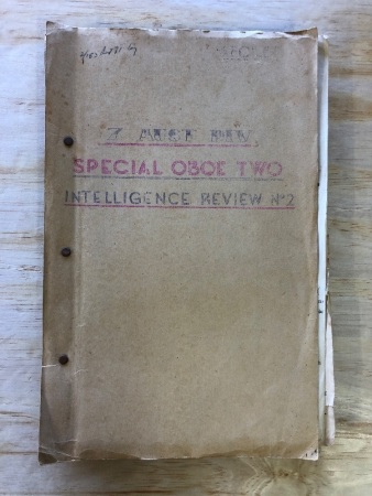 2 Folders on Borneo - Report on AASC Operations with Force Oboe Two - Secret + Special Oboe Two Intelligence Review No.2 - Secret and Includes Maps of Japanese Forces, Concentrations etc. - See Individual Photos