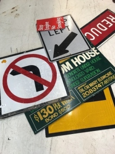 Assortment of Road Signs and Toyota Wheel Caps