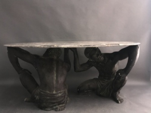 Unusual Table with 2 African Figures as the Base Holding the Top - App. 1650mm x 1020mm. Comes in 3 Pieces - Figures are Fibreglass - Some Damage to Table Top