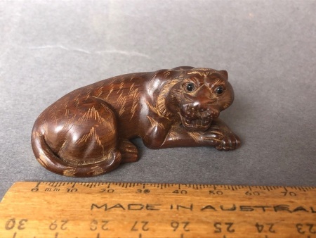 Vintage Japanese Carved Timber Netuske Depicting a Tiger Lying Down with Beaded Eyes - Signed on Inlay to Base