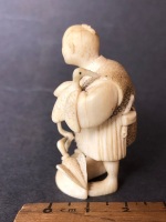 Antique Japanese Carved Ivory Netsue in the Form of a Fisherman with his 2 Fishing Birds. Character Signature to Base - Intricately Carved - 2