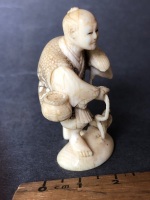 Antique Japanese Carved Ivory Netsue in the Form of a Fisherman with his 2 Fishing Birds. Character Signature to Base - Intricately Carved - 4