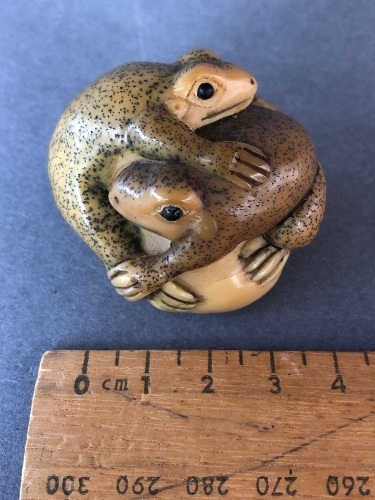 Vintage Japanese Carved Ivory Netsuke Depicting 2 Frogs on a Rock Beaded Eyes and Painted Finish. 2 Character Signature at Base