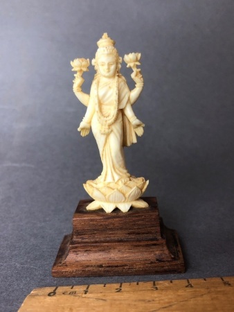 Vintage Intricately Carved Ivory Figure of Lakshmi on a Mahogany Plinth