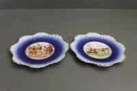 Pair of Austrian Flow Blue and Gilt Edged Porcelain Hunting Plates