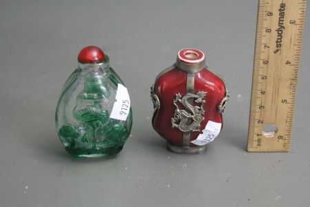 2 x Vintage Chinese Snuff Bottles - 1 Ceramic with White Metal Mounts Stmaped to Base No Stopper - 1 Glass with Raised Images of Birds - Small Crack at Rim