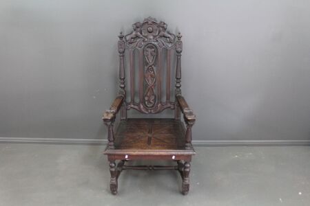 Victorian Oak Gothic Style Hand Carved Throne with Lion Motifs and Arm Rests