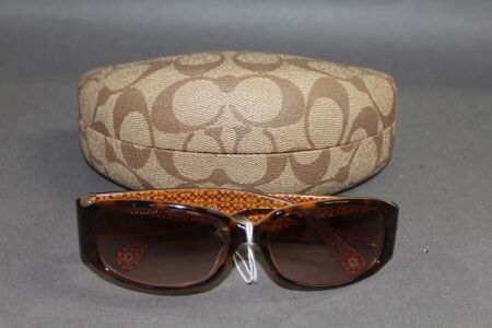 Pair of Coach Sunglasses in Case