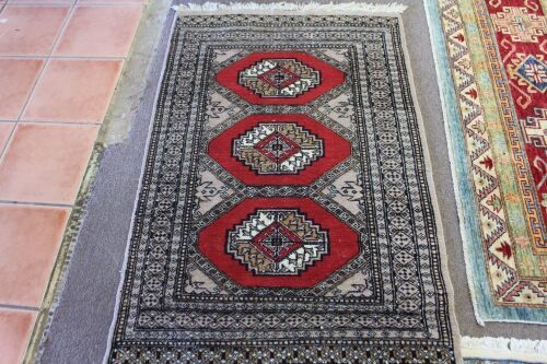 Small Hand Knotted Turkish Wool Rug with Red Lozenge Design