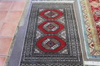 Small Hand Knotted Turkish Wool Rug with Red Lozenge Design