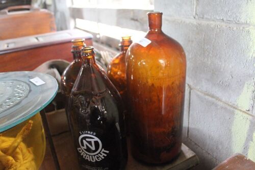 4 Large Brown Bottles inc. Darwing Stubby