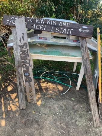 Vintage Carved Kin Kin Track Sign and Dolphins Sign