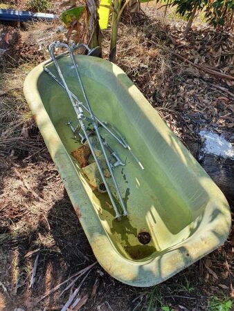 Antique Roll Top Cast Iron Bath with Legs and Chrome Plumbing