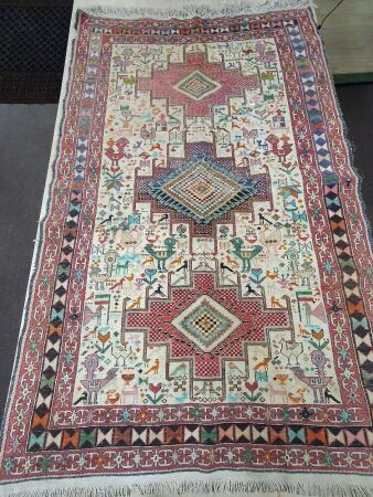 Vintage Belouch Persian Rug Depicting Animals and Birds with Some Colour Bleed and Wear + Lead Tag