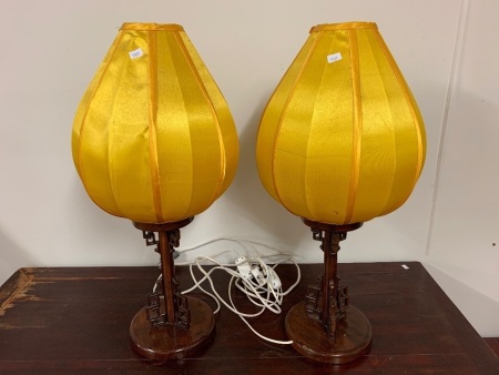 Pair of Chinese Carved Hardwood Table Lamps With Yellow Silk Shades
