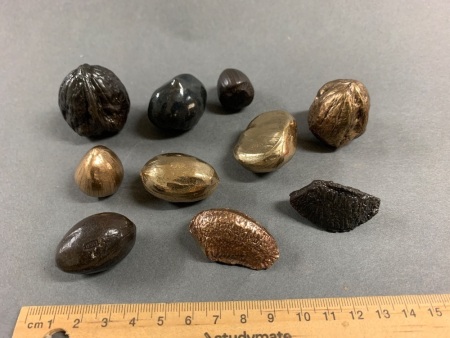 Collection of Cast Metal Nuts Marked DSP