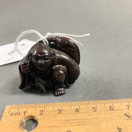 Carved and Signed Timber Fisherman Netsuke