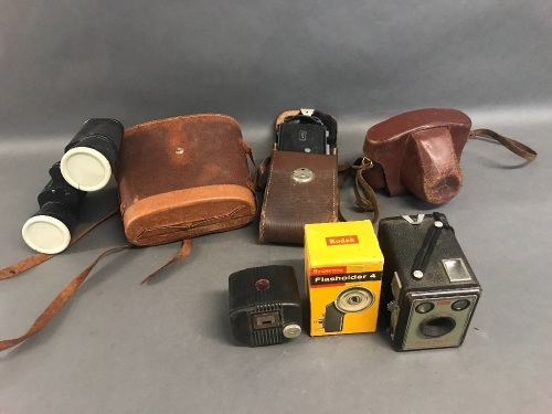 Job lot of cameras including Brownie and Baby Brownie plus Binoculars