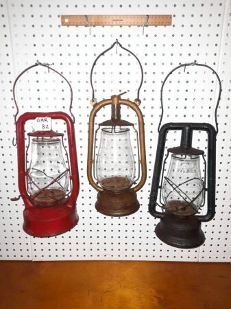 3 X VINTAGE KEROSINE LAMPS - PANMADE IN GERMANY (CENTRE - RARE) LANORAMADE IN AUSTRALIA (RED), DIETZ - MONARCH. - CONDITION GOOD