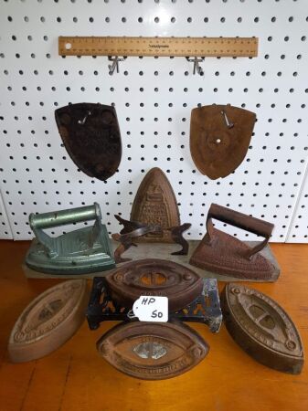 7 X CAST IRONS AND 3 TRIVETS (STANDS) - CONDITION FAIR