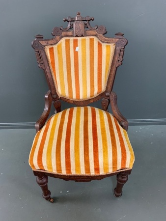 Antique Upholstered Chair on 2 Timber and Brass Casters