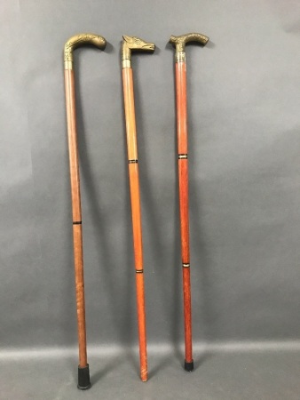 3 Brass Topped Walking Sticks - 2 With Spring Loaded Test Tubes Inside