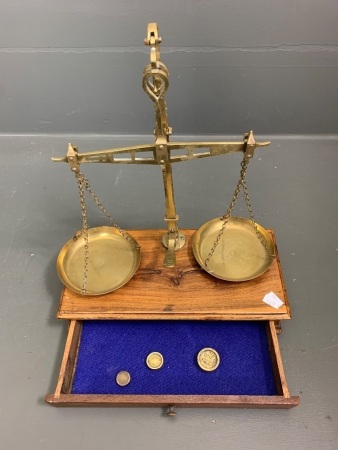 Pair of Brass Gold Balance Scales Mounted on Timber Box with Drawer and Part Set of Bullion Weights