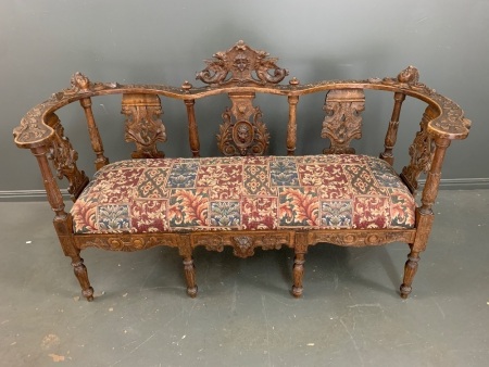 Elaborately Carved 19th Century French Parlour Sofa with Upholstered Seat - Carvings Depict Griffins with Cherub and Lions Head to Centre