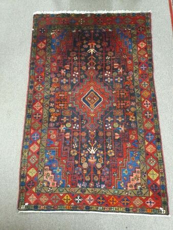 Heavy Vintage Persian Tribal Hand Knotted Wool Rug in Reds, Blue, Black with Crosses and People Design