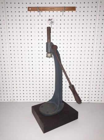 VINTAGE CAST IRON BOTTLE CAPPER ON TIMBER BASE. 530 HIGH - CONDITION GOOD