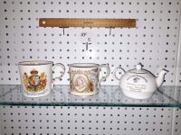 1897 QUEEN VICTORIA MUG, FEATURING SPORT! VERY RARE. QUEEN ELIZABETH IST COMMEMORATIVE MUG AND SINGLE CUP TEA POT. - CONDITION GOOD