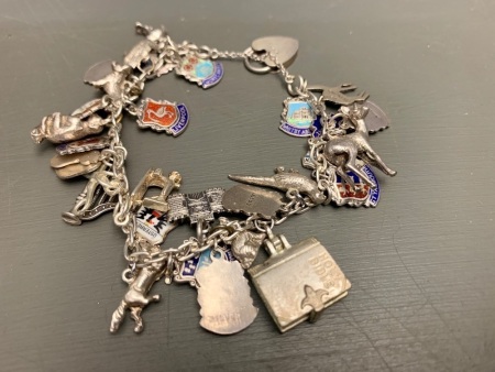 Vintage Sterling Silver Bracelet and 32 Silver Charms from 1910-1957