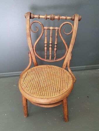 Antique Cane Seated Bentwood Shortened Nursing Chair with Harp Design Back