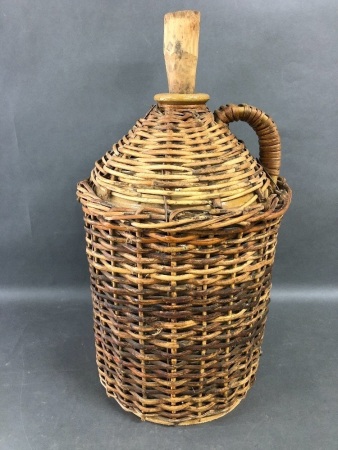 Vintage Stone Flagon in Cane Basket