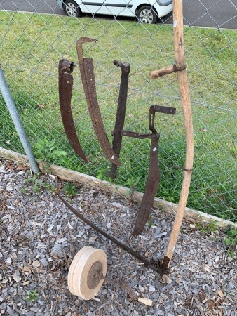 Vintage Timber Handled Scythe, 2 Scythe and 1 Hay Knife Blades, Swindle Bar and Grinding Wheel