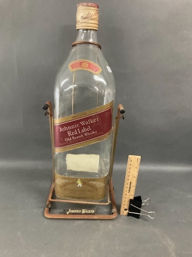 Large (sadly empty) Johnnie Walker Bottle on Stand