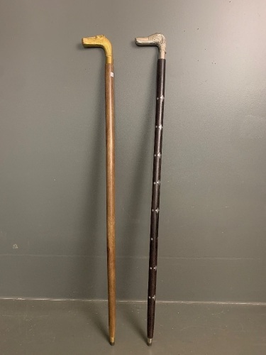 2 Contemporary Walking Sticks with Metal Animal Head Mounts