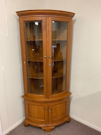 Tall Contemporary Teak Corner Display Cabinet with Curved Glass Panels and Keys