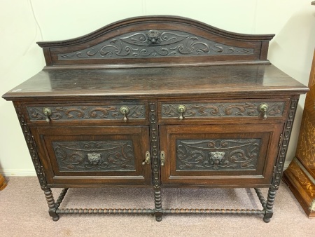 Antique Weslh Oak Sideboard with Art Nouveau and Lions Head Carved Panels above Bobbin Turned Legs and Stretchers