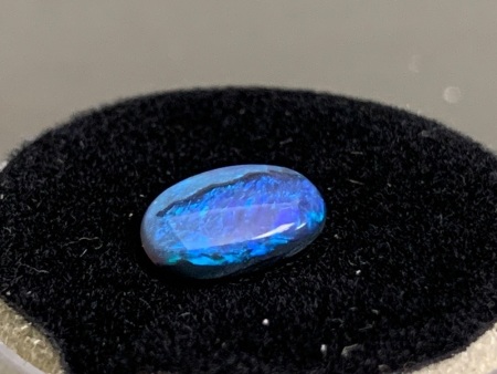 0.93 ct Solid Black Lightning Ridge Opal 9 mm x 5.4 mm Oval. Dark Blue with Green