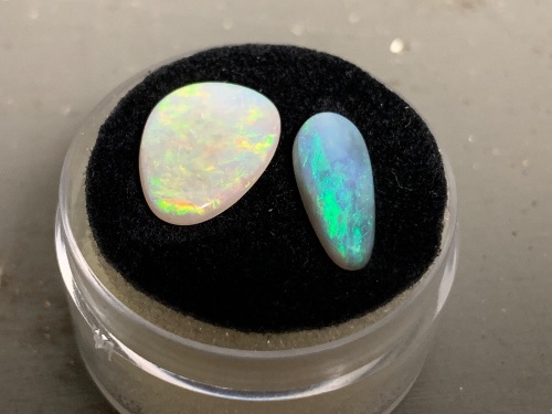 2 Stones totalling 2.85 ct - Both Freeform  Solid Opals from Cooper Pedy - Greens and Orange in one - Peacock in the other