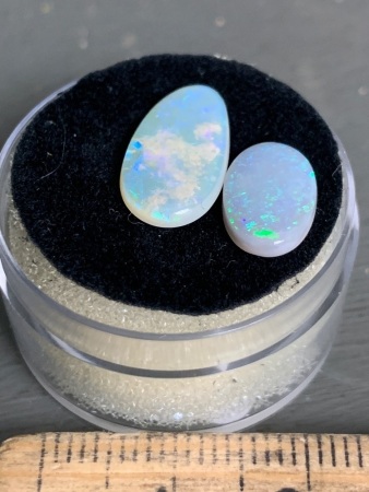 2 Stones Jellybase Coober Pedy Solid Opals totalling 2.8 ct. Freeform One Oval and one Oval /Teardrop 15.8 mm x 8mm. Beautiful blue, lilac and green flashes.