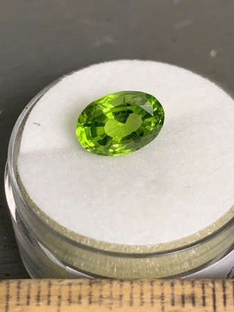 2.45 ct Lively Green Peridot 10 mm x 7 mm Oval x 5 mm Deep.