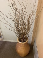 A large Pottery urn with reeds