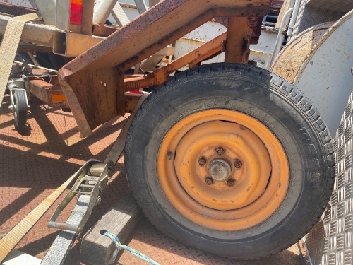 A frame cable trailer yellow