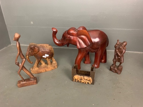 1 large wooden elephant, 1 small wooden elephant, 1 card/coater holder wooden with elephants, sml statue wooden man with drum, sml wooden statue Asian man