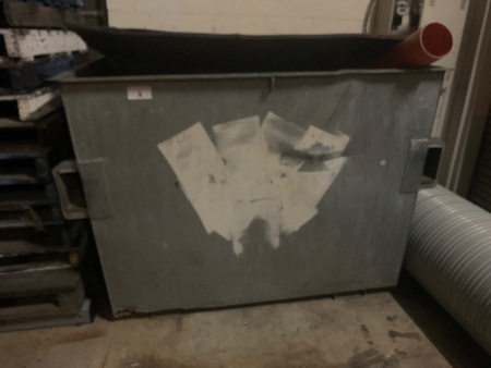 Large metal skip bin with PVC bends